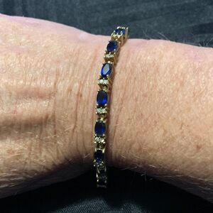 Like New Avon Gold-tone & Sapphire Color Gemstones Tennis Bracelet